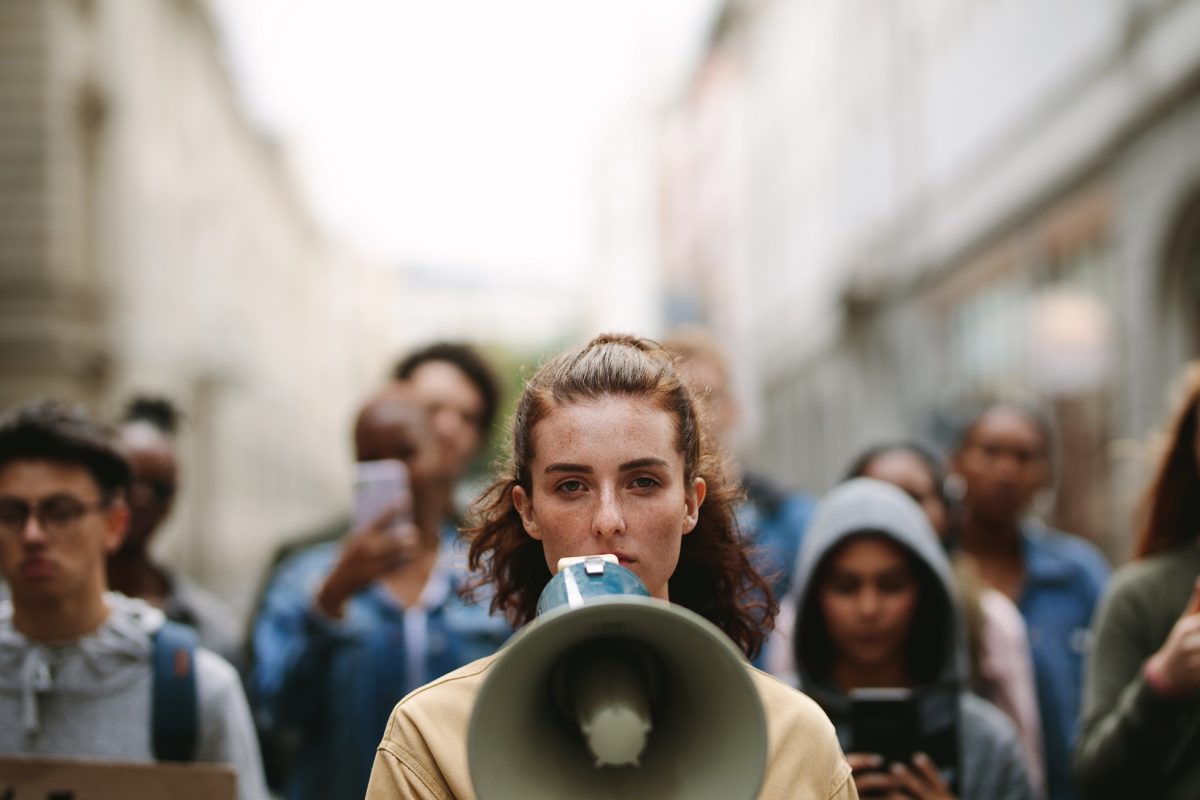 People On Strike Protesting With Megaphone