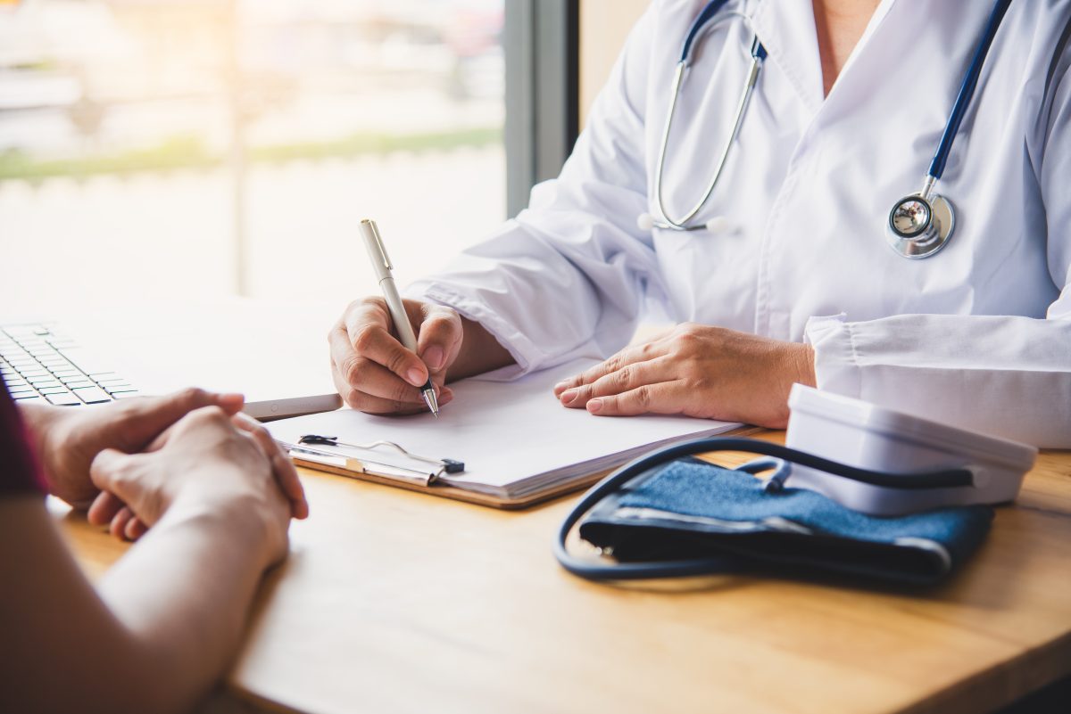 The Doctor Is Discussing With The Patient After A Physical Exami